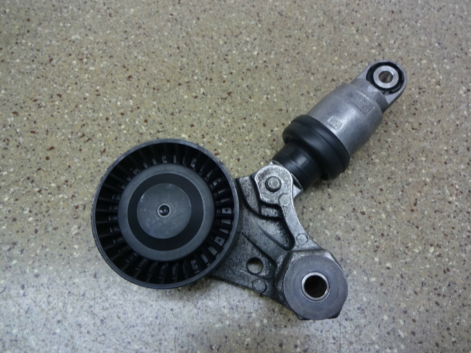 auxiliary belt tensioner