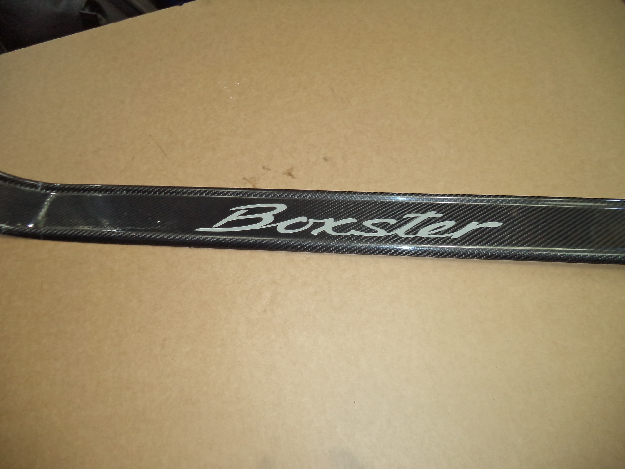 PORSCHE BOXSTER O/S GENUINE CARBON KICK PLATE. loc subst 98655198100