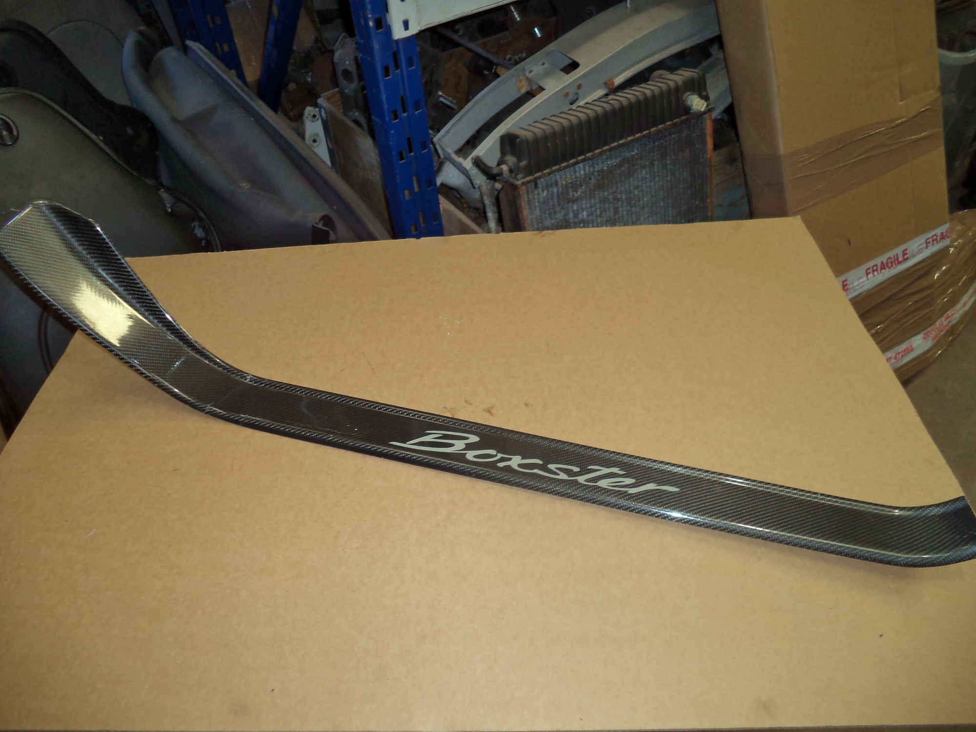 PORSCHE BOXSTER O/S GENUINE CARBON KICK PLATE. loc subst 98655198100